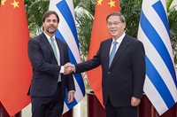 李強會(huì )見(jiàn)烏拉圭總統拉卡列