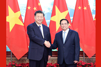 習近平會(huì )見(jiàn)越南總理范明政