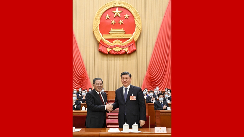 習近平同李強握手